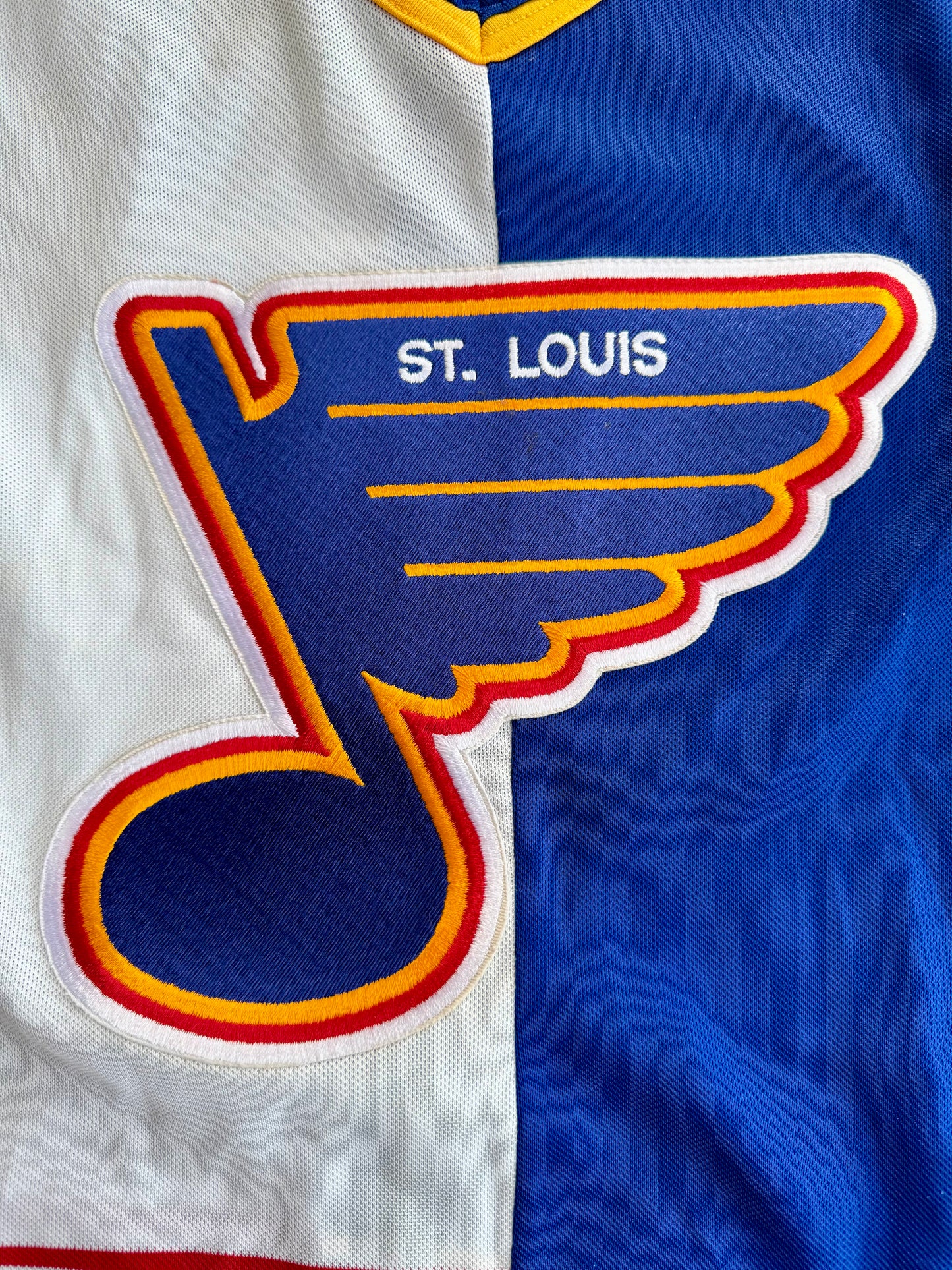 Close-up of St. Louis Blues team logo on 1990s CCM VTG NHL hockey jersey