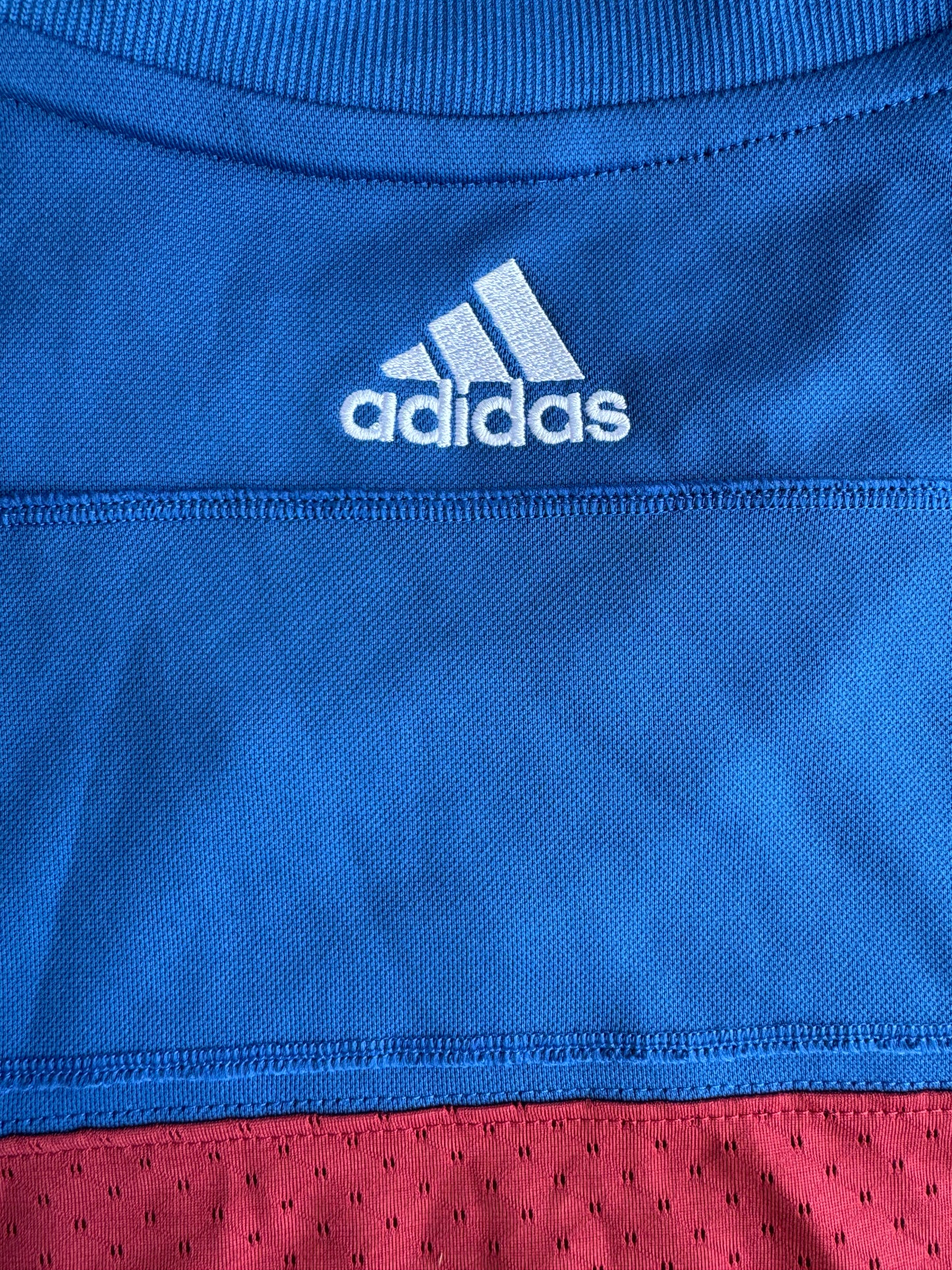 Montreal Alouettes Adidas CFL home jersey, back neck logo close-up
