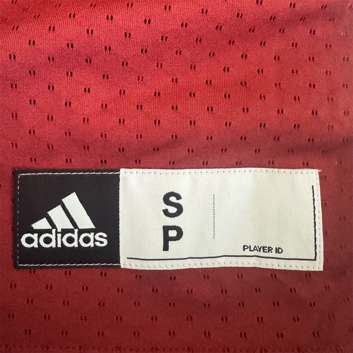 Montreal Alouettes Adidas CFL home jersey, bottom right front logo detail