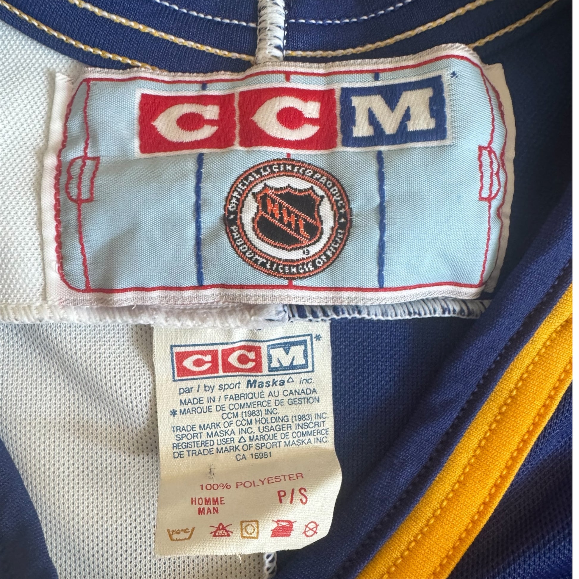 Close-up of size and CCM tag on 1990s St. Louis Blues VTG NHL jersey
